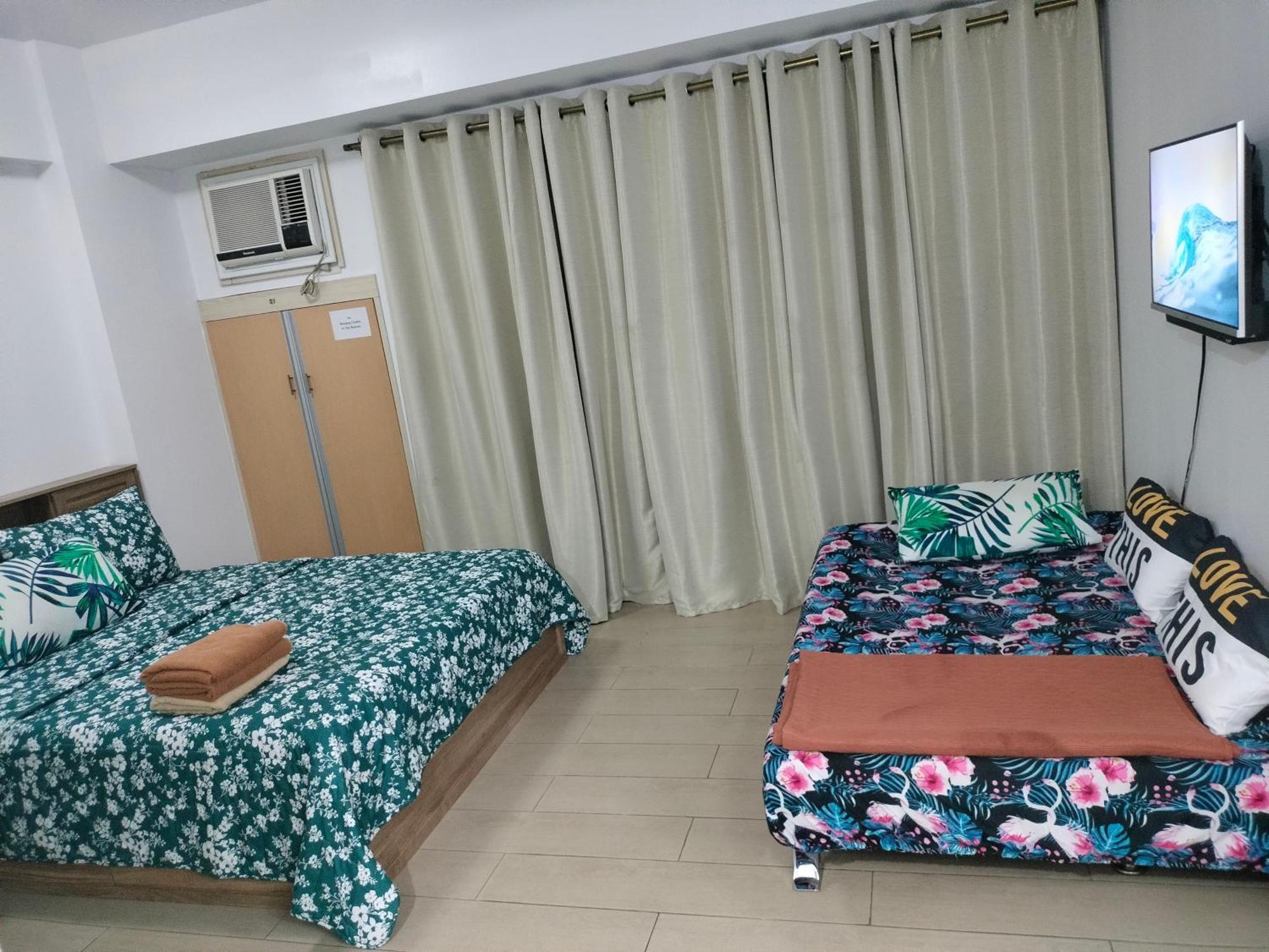 Rqui Condotel Newport Pasay Buitenkant foto